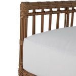Close-up of crisp white cushion fabric with smooth texture on chair seat
