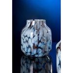 Single lit marbled brown and white vase on reflective black surface with blue background