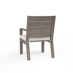Rear view showing horizontal slat design and cushioned seat back of Laguna Dining Chair