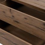 Interior view of two open drawers showing wood finish and depth