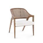 Three-quarter front view highlighting brass caps on chair corners and the tapered mahogany legs