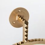 Side detail of carved triangular pattern on gold cast aluminum hanging bracket