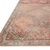 Close-up angled corner view highlighting the textured pile and detailed geometric border of Malik Dove Sunset Rug