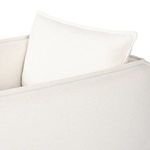 Rear left angle of Andre Outdoor Swivel Chair showing solid slipcover fit