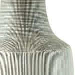 Close-up of lamp neck detailing intricate grid pattern hand-painted onto textured surface.