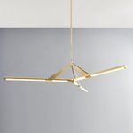 Jonas chandelier suspended in a room setting against a soft gray wall background