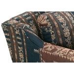 Detailed view of sofa backrest cushion showing fabric pattern and padding density