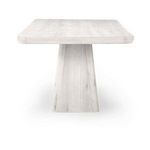 End view showing thickness of tabletop and full shape of tapered pedestal base