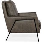 Side profile highlighting angled metal frame and leather upholstery with visible stitching on Amette chair