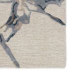 Detailed close-up of pile texture highlighting cut and looped weave in neutral colors
