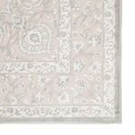 Close-up detail of corner showing patterned high-low texture with floral and scroll elements