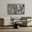 Adair side table positioned next to abstract framed art and beige sofa on woven rug in softly lit room