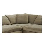 Close-up on corner seat with three back cushions meeting at angle and deep seat cushions