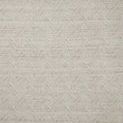 Ivory rug with layered geometric pattern in thick, handwoven wool and cotton yarns