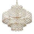 Lower-angle lit chandelier showcasing intricate flower and clover detail