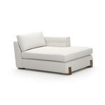 Counter Balance Chaise with low profile, cream fabric upholstery, plush cushions, and oak block feet