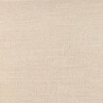 Close-up of cream linen fabric texture on upholstered headboard
