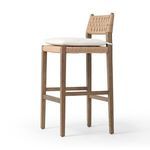 Three-quarter view of Hamlin Stool angled with cushion and visible frame details