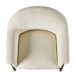 Fabric weave close-up showing looped texture and soft matte finish in light cream