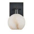 Dimly lit alabaster globe seen from the front with bronze backplate and bracket