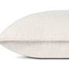 side view showing pillow thickness and piped edging detail in ivory color