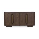 Front view showing symmetrical design and placement of brass pulls on the dark wood buffet