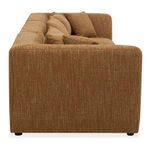Side view of Lowtide sectional showing fabric texture and cushion layering with armrest