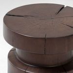 Angled view of table top highlighting circular rings and deep natural cracks