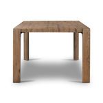 End view of rustic oak plank-style dining table showing thickness of tabletop and square legs