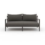Sherwood sofa front view on plain white background emphasizing thick charcoal cushions and sturdy legs.