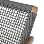 Close-up of upper chair back corner with thick wrapping of gray cord over wood