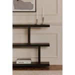 Miri Small Shelf in styled interior with candles on top shelf and a book on middle shelf against beige wall