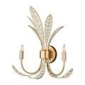 Three-quarter side view with unlit bulbs on white glass leaves outlined in brass