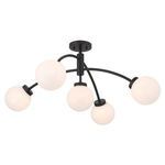 Redfield light fixture at a side angle highlighting curved arm design and orb spacing