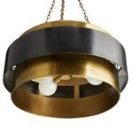 Underneath view showing four white bulbs inside the brass and dark bronze pendant frame