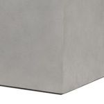 Close-up of bottom corner showing sharp edges and smooth concrete surface