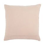 back view showing pillow's hidden zipper closure on solid blush fabric