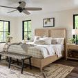 Harlyn Bench positioned at foot of bed in a cozy bedroom scene with neutral decor