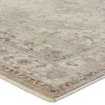 Close-up corner view showing short fringe and textured space-dyed polyester fibers in tan and cream shades