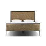 Xander Upholstered Bed with textured damask fabric headboard and footboard framed by black iron with tapered legs and roun...