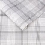 Heritage Plaid Wallpaper in soft gray tones with large-scale plaid pattern and matt paper finish