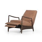 Side angle of recliner with footrest partially extended revealing reclining mechanism