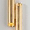 Rylane Wall Sconce illuminated, showing warm light glowing from both ends of the tubes.