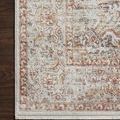 Close-up showing texture and pile detail of the rug corner placed on dark wood floor