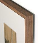 Close-up of walnut wood frame corner showing grain and mitered edge