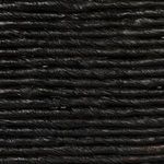 Close-up detail of tightly woven black corn rope texture highlighting natural fibers