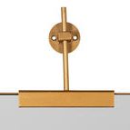 Close-up of top mounting hardware with round wall plate and gold metal arm attaching to frame