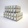 Stacked arrangement showing smaller box atop larger version with consistent cubed bone pattern