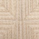 Close-up of tightly woven vintage white all-weather wicker seat with distinct pattern