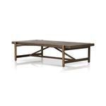 Side perspective of coffee table with visible wood grain and robust joinery underneath